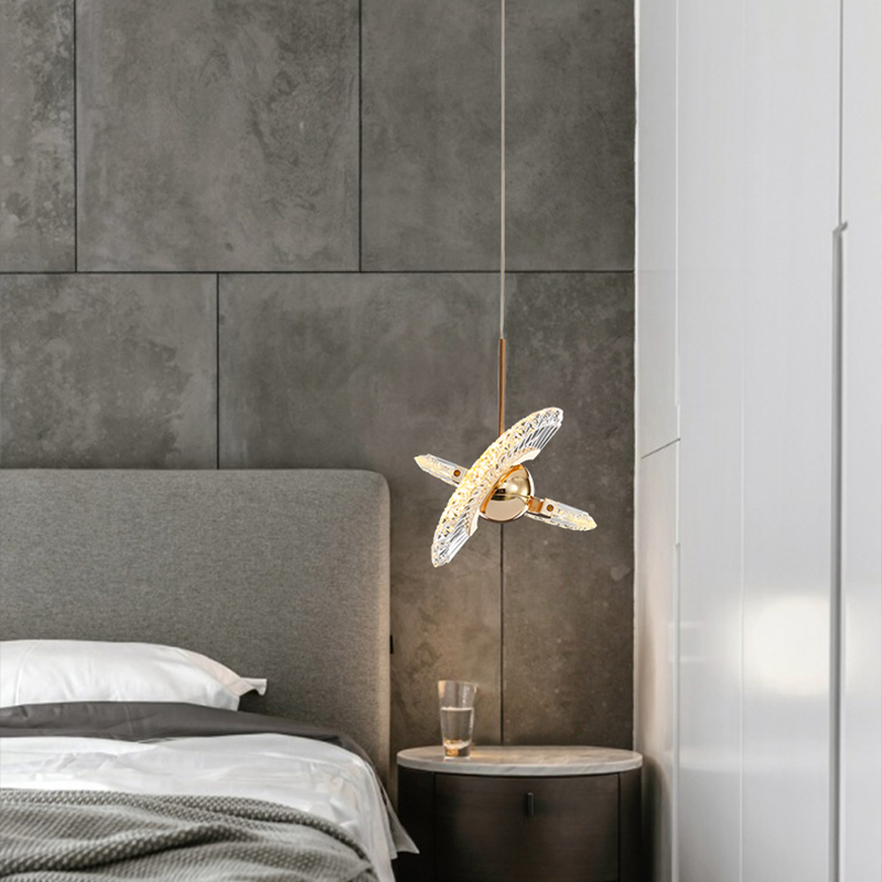 Stylish installation of an energy-saving pendant light in a contemporary living room setting.