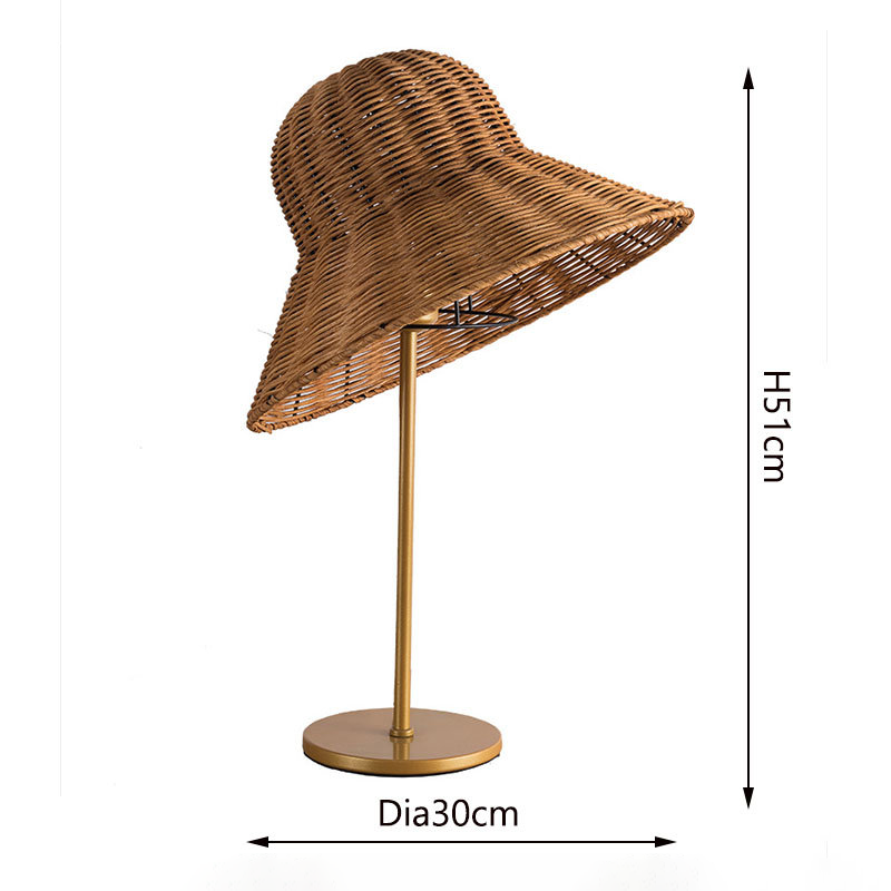 Side view of the bamboo table lamp illuminating a cozy living room.