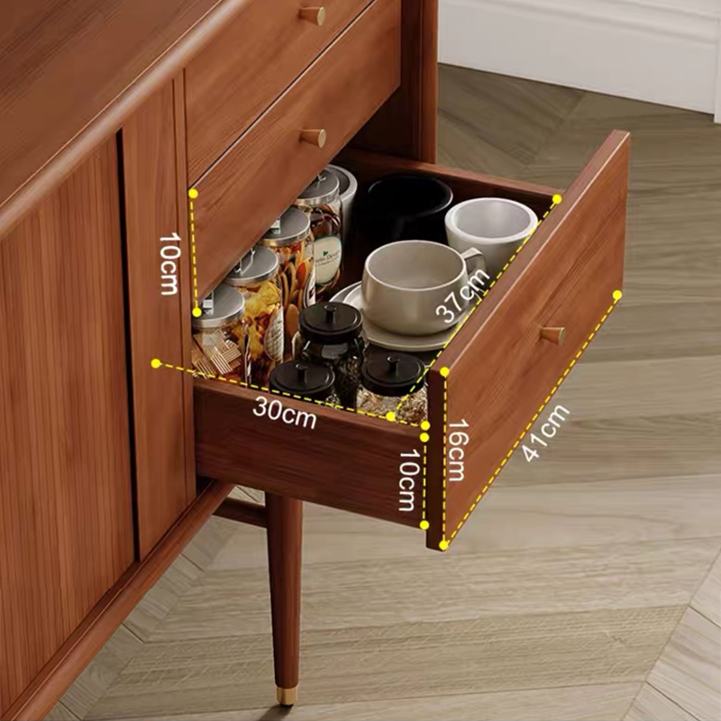 Side view of the wooden cabinet highlighting the unique brass knobs and solid wood construction.