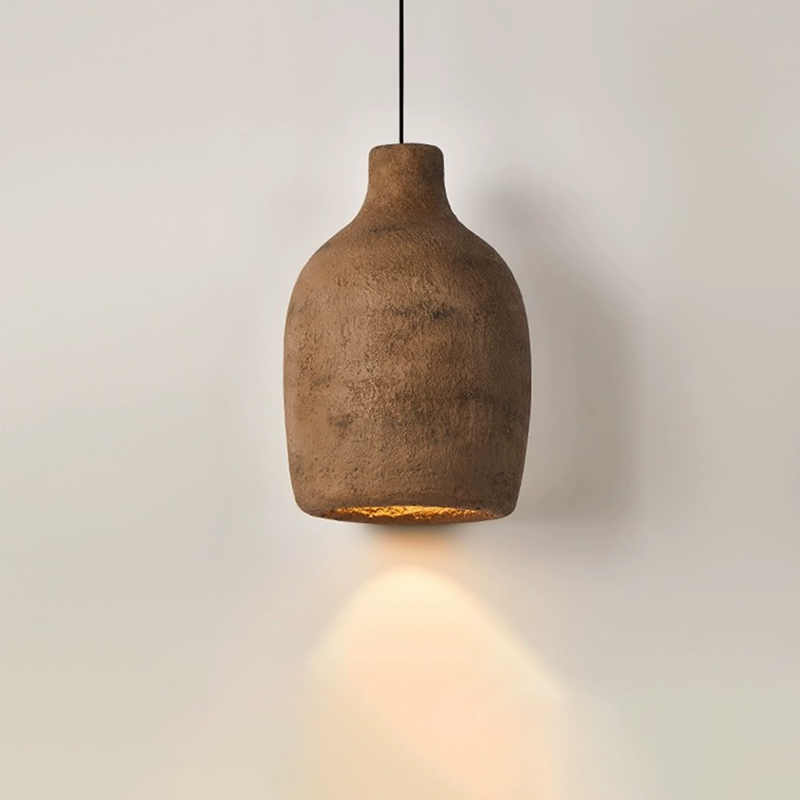 Elegant Japanese-style resin pendant light in a cozy living room setting.