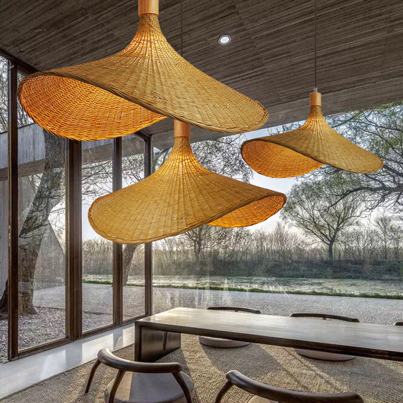 The intricate weaving of the bamboo wicker pendant light showcasing its natural texture.