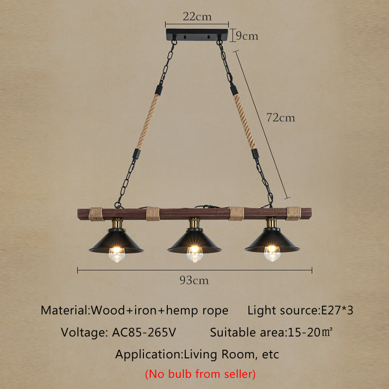 Close-up of rustic industrial hemp rope pendant light showcasing wooden and metal details.