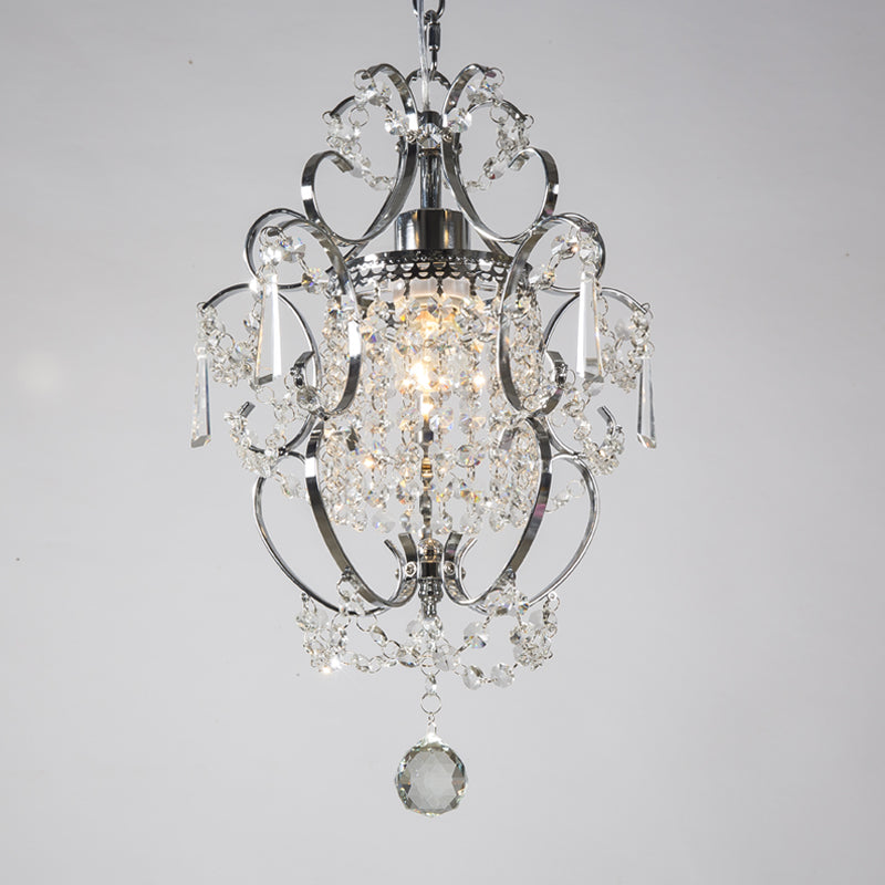 The chandelier installed in a stylish dining area, enhancing the decor with its elegant glow.