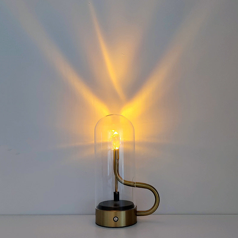 Luminous Flame Rechargeable Glass Table Lamp showcasing candle flame effect in a cozy living room.