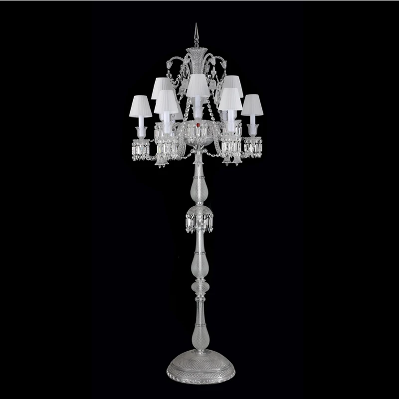 Elegant crystal chrome floor lamp showcasing its stylish round base in a contemporary living room.