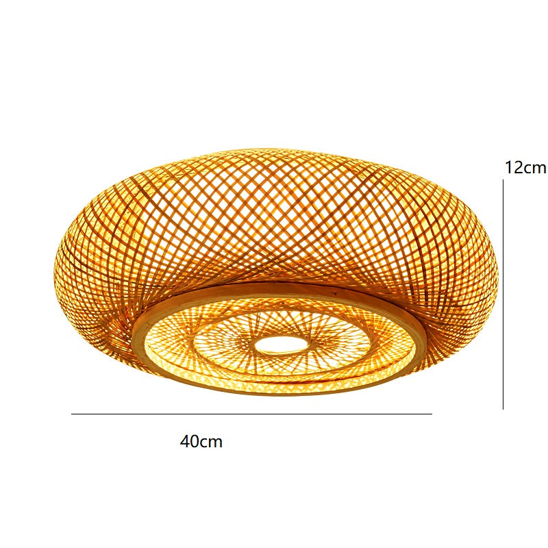 Bamboo ceiling light casting a warm glow in a modern bedroom.