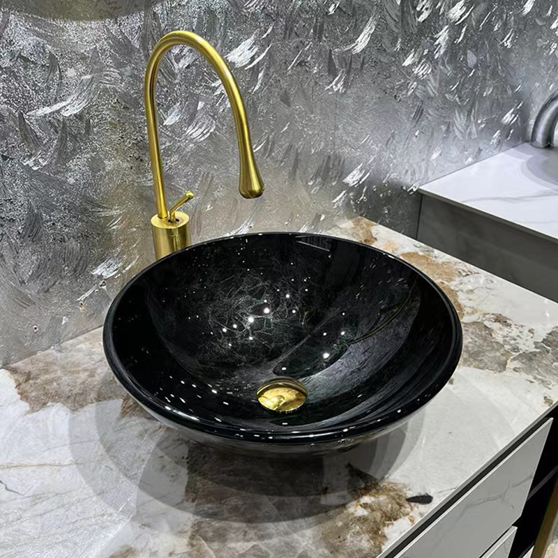 Stylish gray blue shoe-shaped tempered glass vessel sink for modern bathrooms.