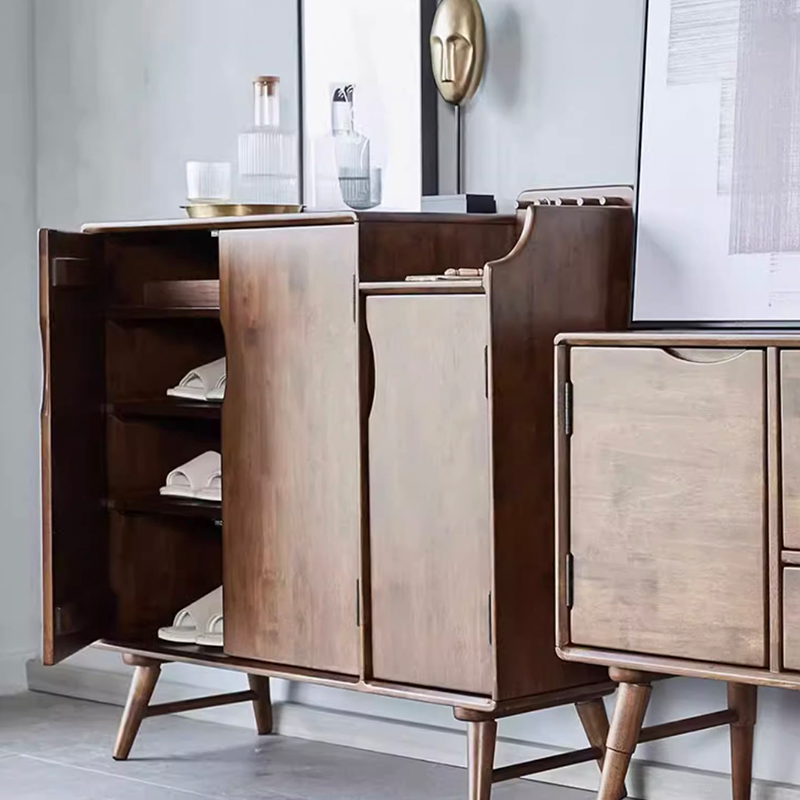 Close-up of drawers on the best wood shoe storage cabinet for entryway with birch wood finish