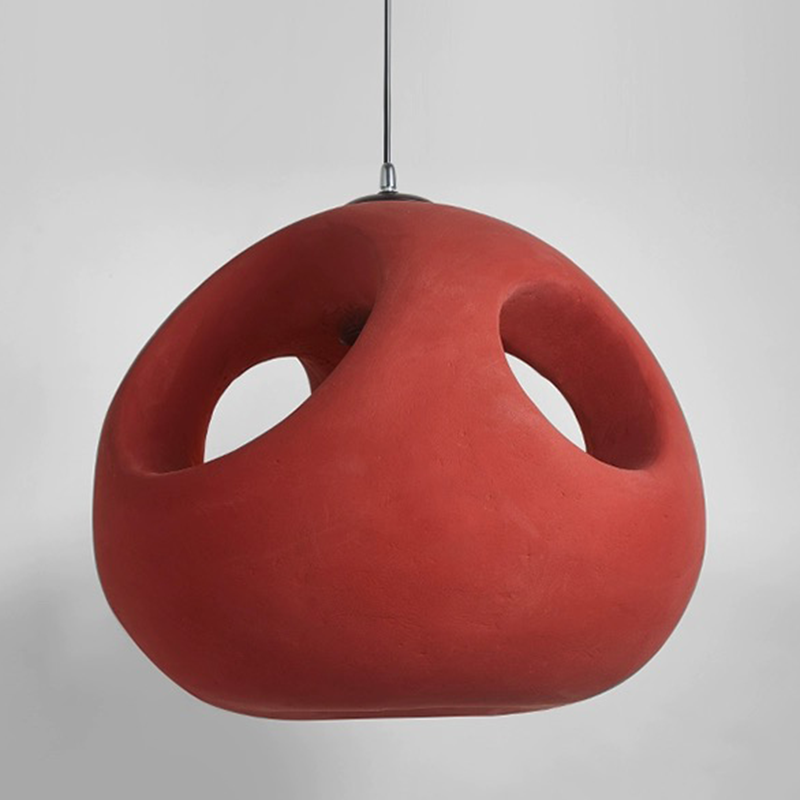 Nordic pendant light hung elegantly above a dining table, enhancing the ambiance.