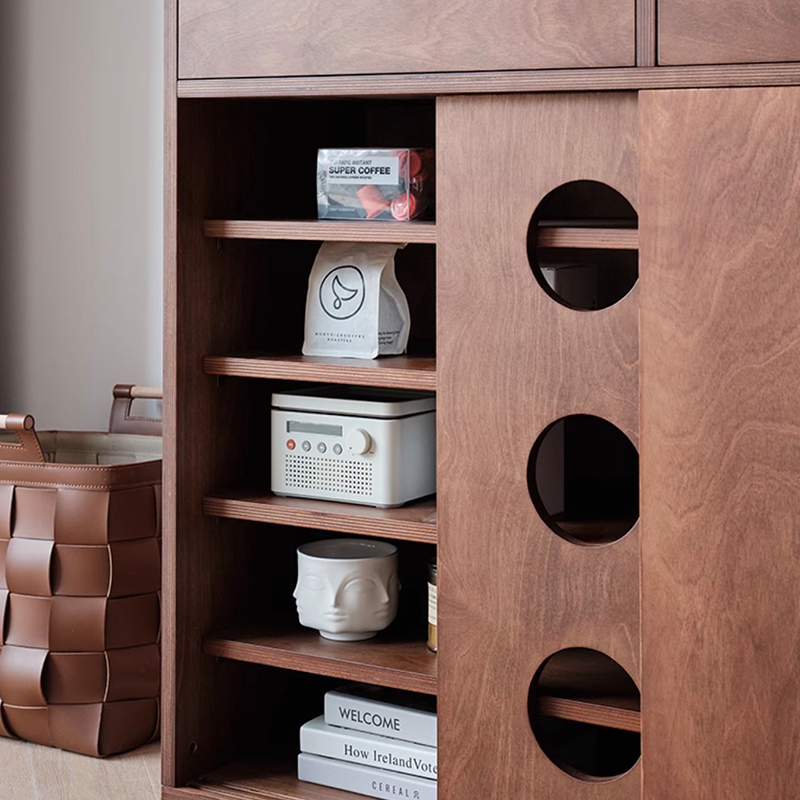 Close-up of the cabinets birchwood finish and hardware details, emphasizing quality craftsmanship.