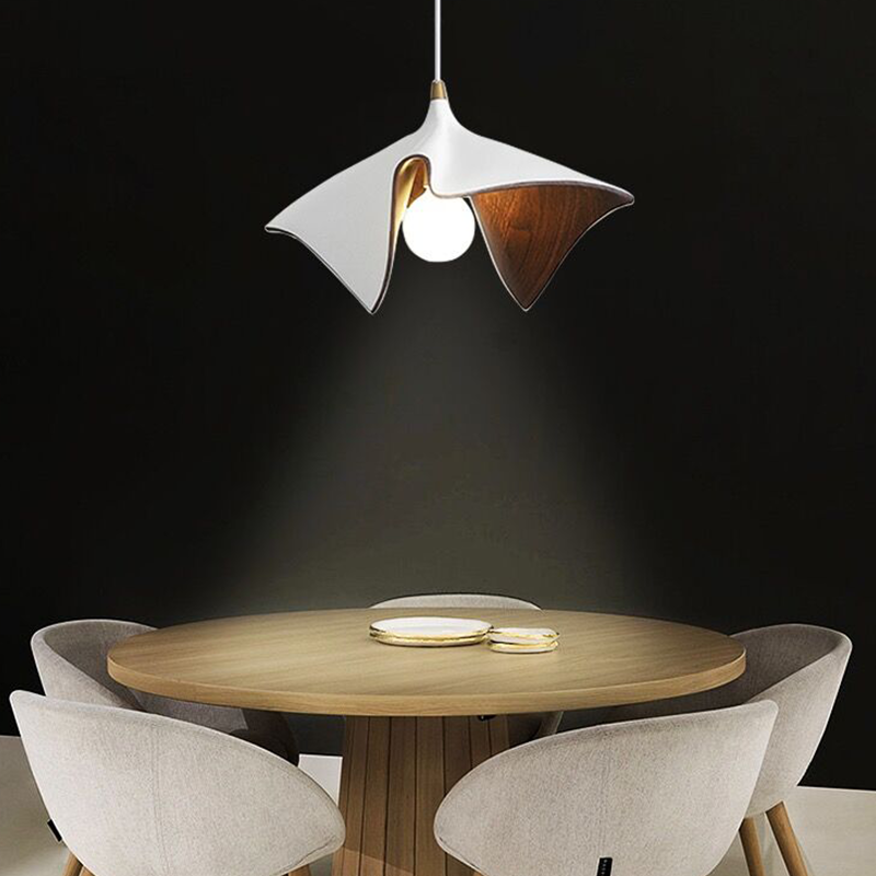 Side view of the pendant light highlighting its unique pleated design and structure.