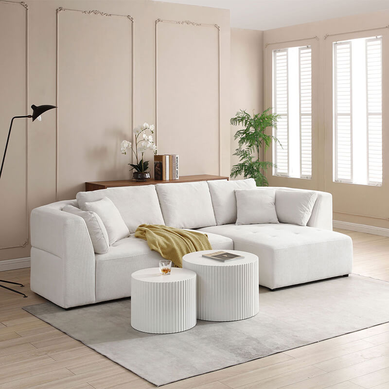 Side view of the elegant beige sectional sofa showcasing its right-facing chaise and spacious seating.