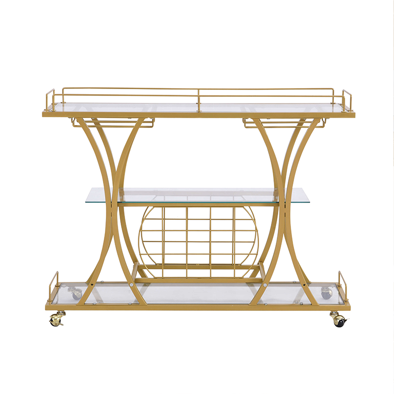 Close-up of the gold bar carts glass holder and shelves, emphasizing its luxurious design.
