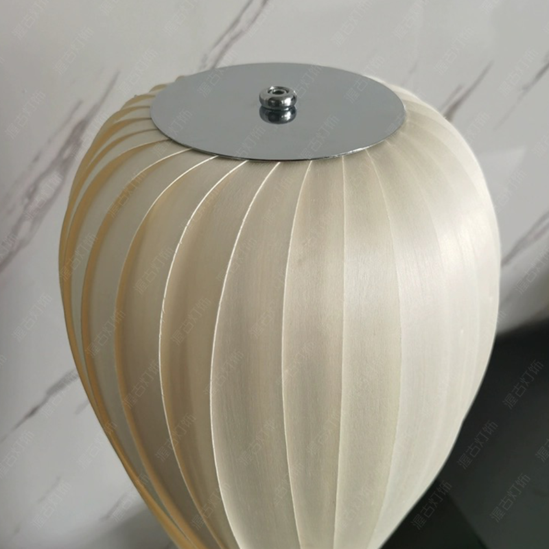 Elegant fabric LED floor lamp showcasing soft light in a modern living room.