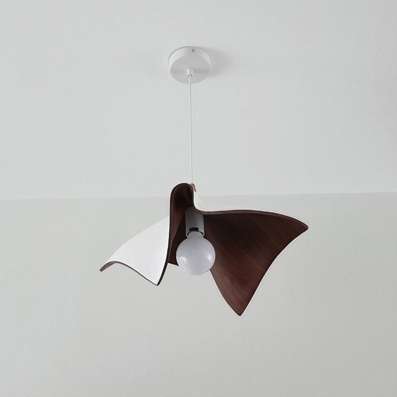 Side view of the pendant light highlighting its unique pleated design and structure.