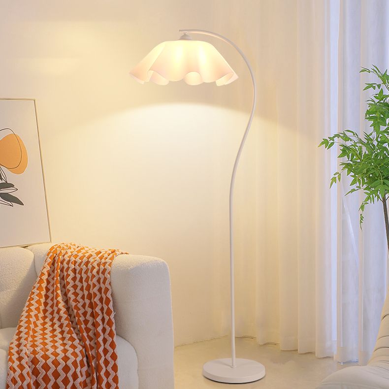 Close-up view of the sleek black base of the modern lamp, highlighting its unique design.