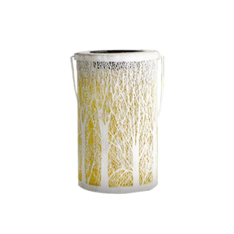 Solar lantern positioned on a patio table, enhancing outdoor ambiance.