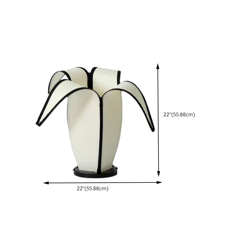 Close-up of the paper shade and unique design features of the lamp.