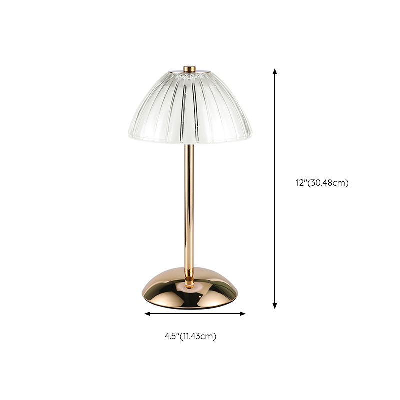 Touch switch detail of the best LED table lamp with glass shade, demonstrating its functionality.