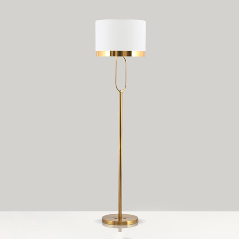 Close-up of the white drum shade on the modern column lamp, showcasing its fabric texture.