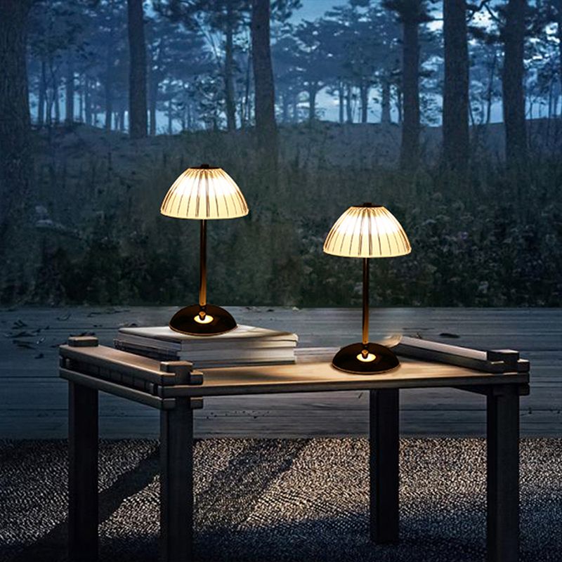 Touch switch detail of the best LED table lamp with glass shade, demonstrating its functionality.