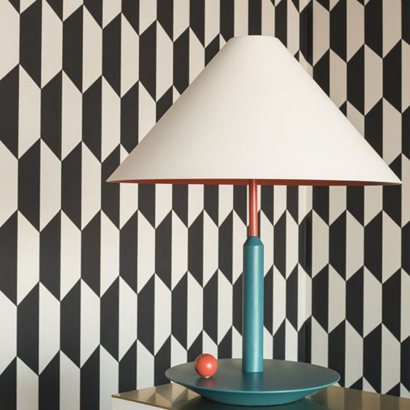 Close-up of the affordable modern bedside lamp with LED designed for reading beside the bed.