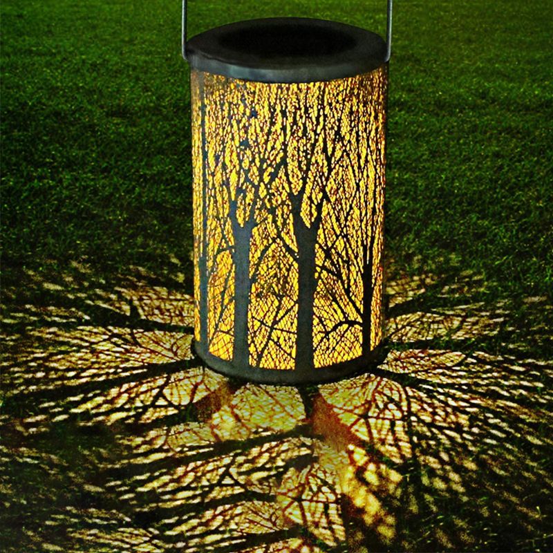 Close-up of LED hanging light showcasing intricate patterns on the ground.
