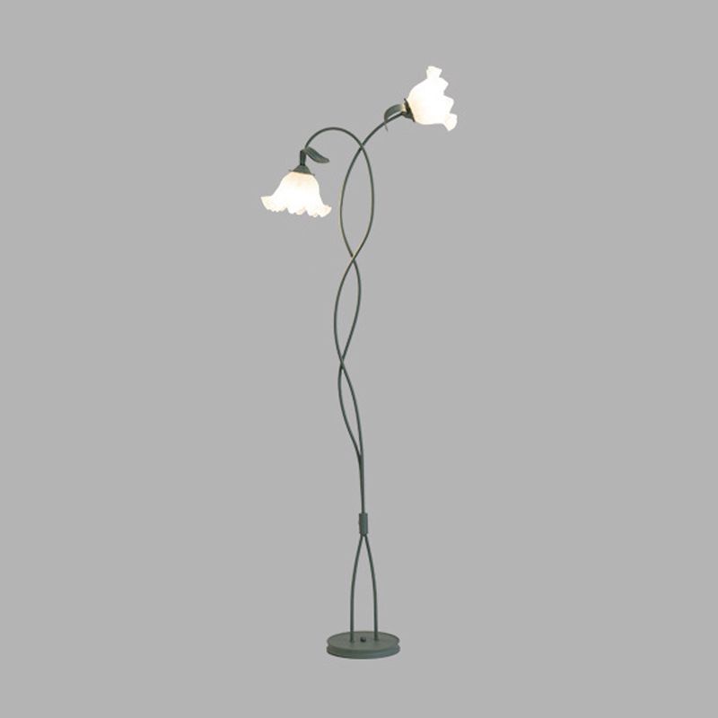 Elegant green floor lamp in a cozy living room setting