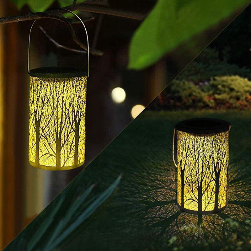 Elegant solar lantern hanging in a garden, radiating warm light.