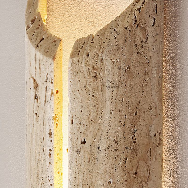 Close-up of the beige wall sconce showcasing its stone shade and modern design