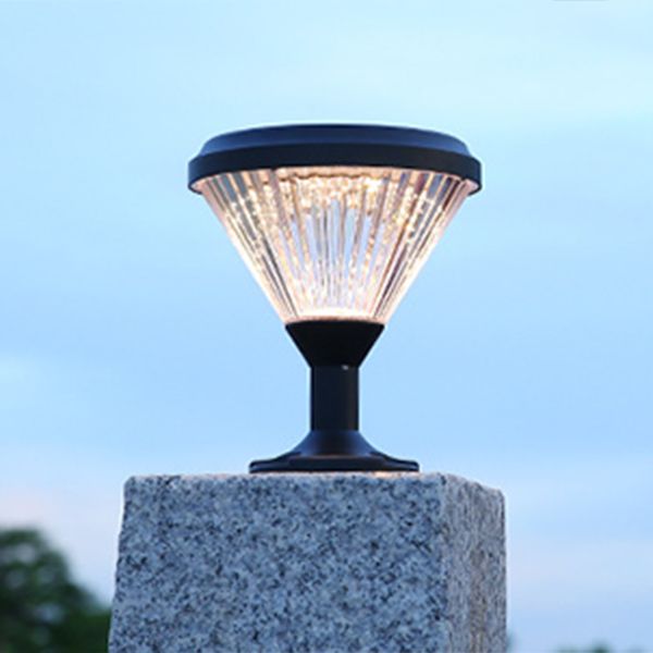 Solar powered outdoor lighting in a beautifully landscaped yard