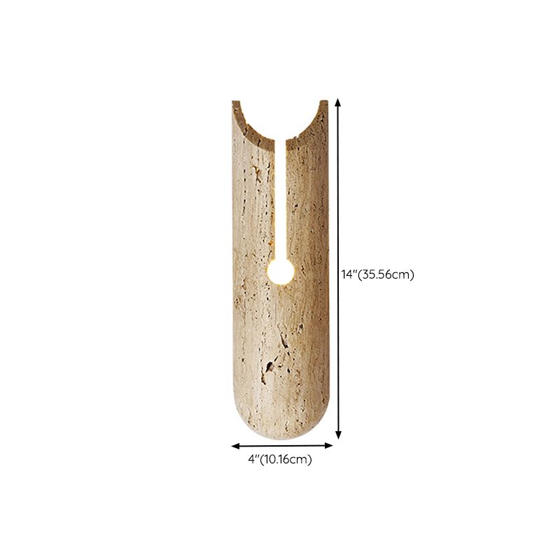 Close-up of the beige wall sconce showcasing its stone shade and modern design