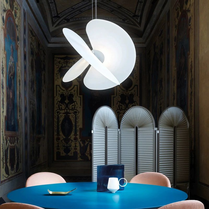 Front view of the silk pendant lighting above a modern living room setup