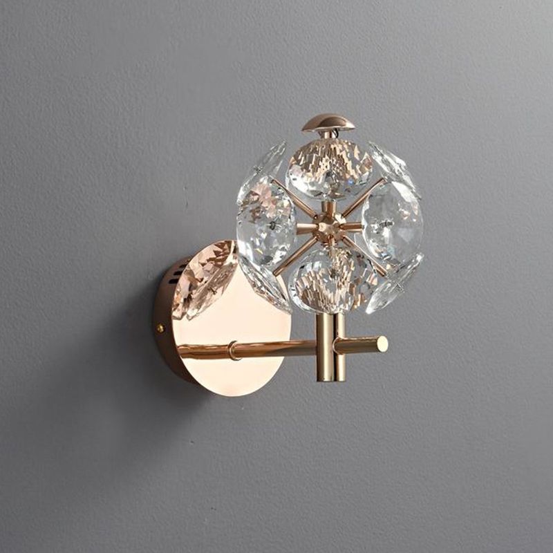 Stylish wall sconce installed in a hallway, emphasizing its luxurious design.