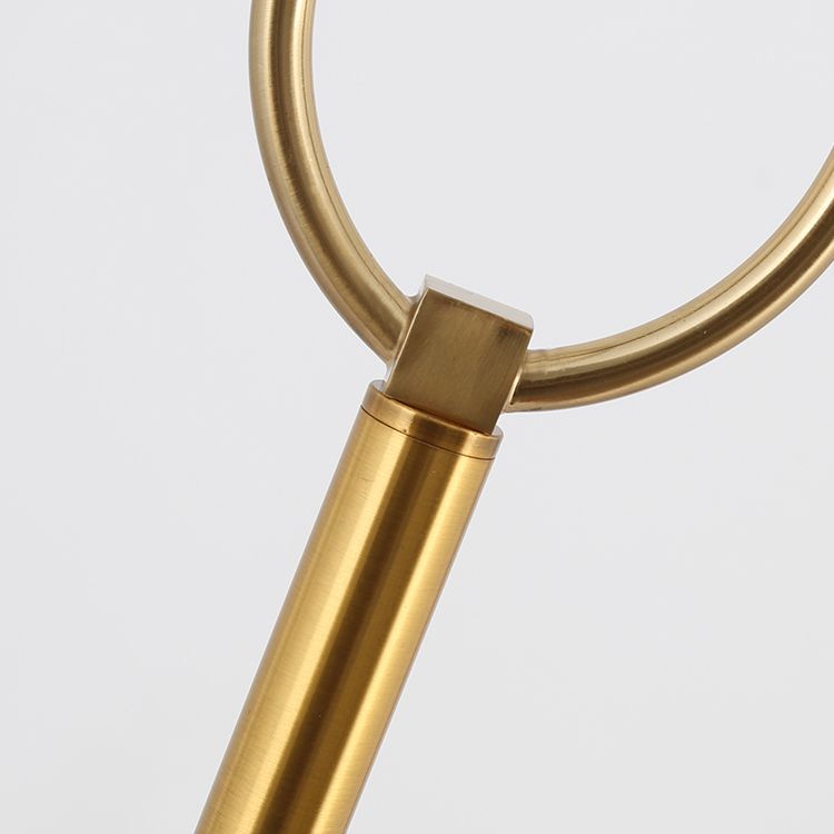 Close-up of the white drum shade on the modern column lamp, showcasing its fabric texture.