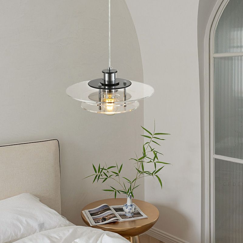 Top-down image showing the geometric shape and round canopy detail of the LucentForm pendant light