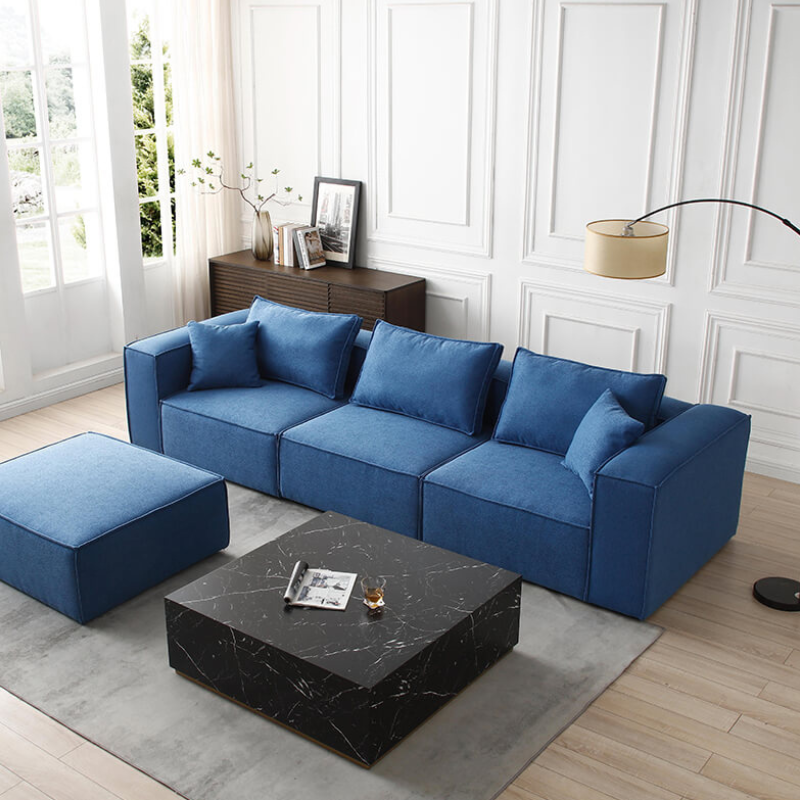 Versatile Blue Modular Sectional Sofa in a cozy living room arrangement, highlighting its deep seating and elegant lines.