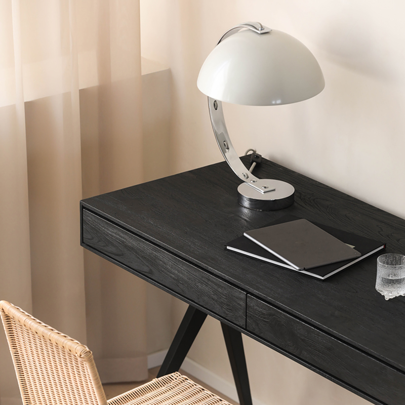Side view of the minimalist desk highlighting the two spacious drawers.