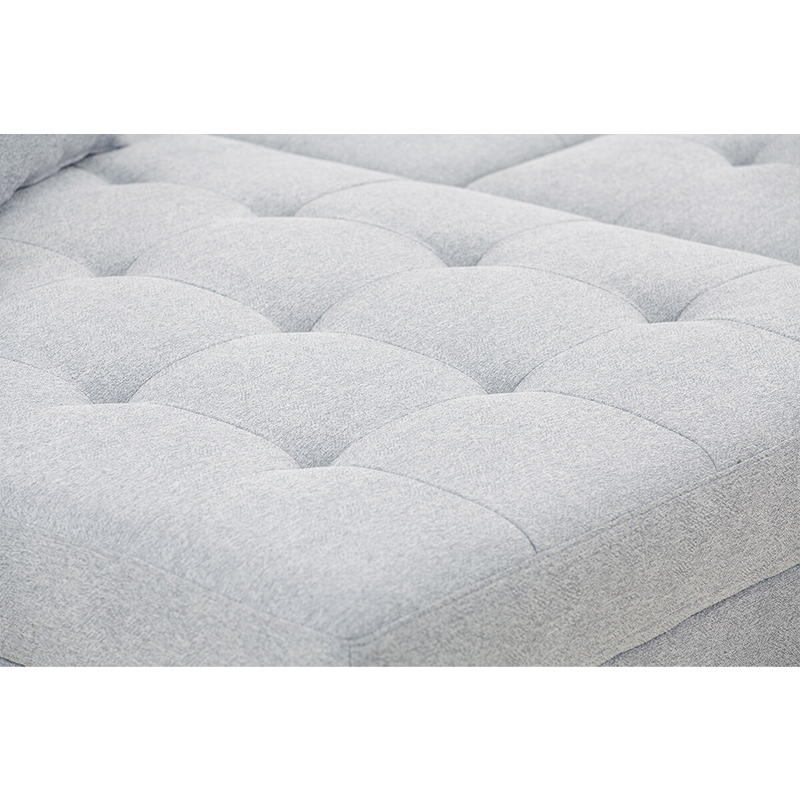 Close-up of the soft fabric and cushioning on the L-shape sofa
