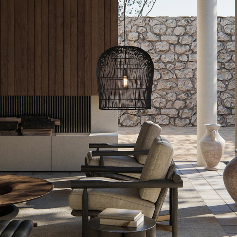 Stylish modern pendant light illuminating a cafe interior.