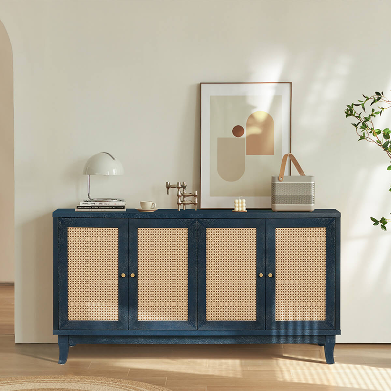 Elegant blue wood sideboard styled with books and decor in a cozy living room setting.