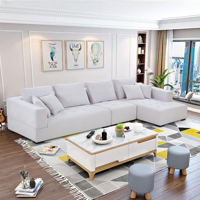 Chic beige linen mid-century sectional sofa showcasing the right chaise design.