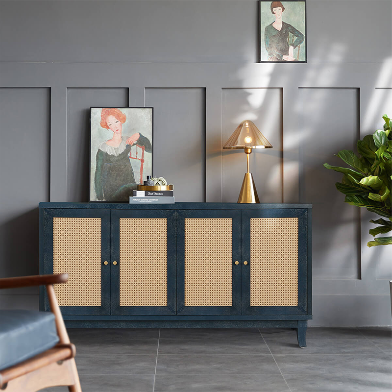 Close-up of the rattan doors on the blue sideboard, highlighting craftsmanship and texture.