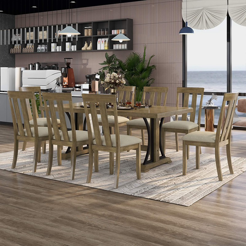 Angled view of retro walnut dining table with eight cushioned chairs