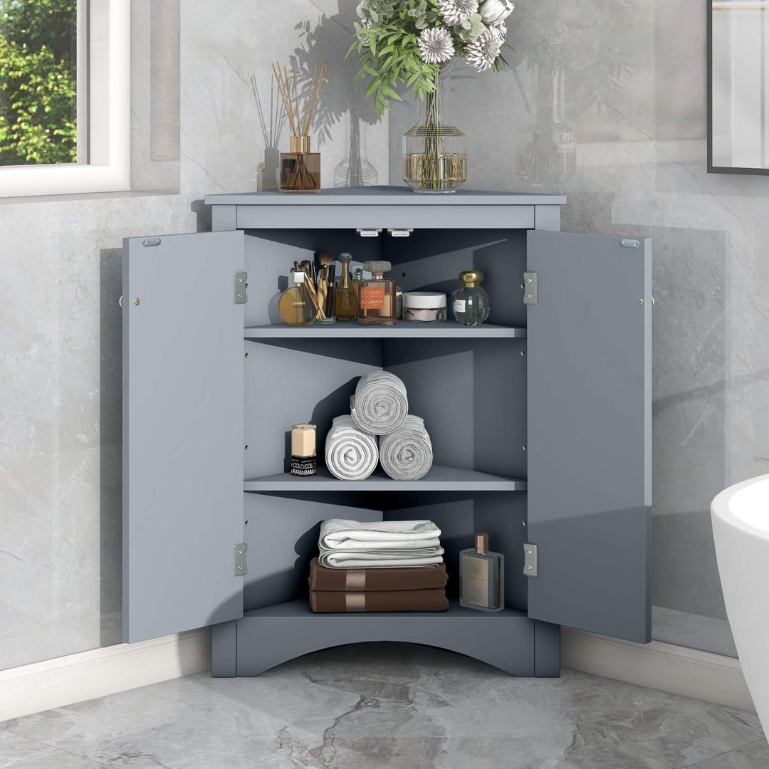 Close-up of the triangular bathroom cabinet with its sleek design and painted finish.