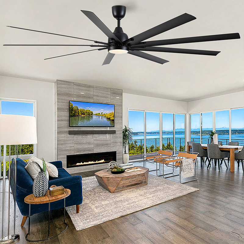 Large black aluminum farmhouse ceiling fan in a cozy living room