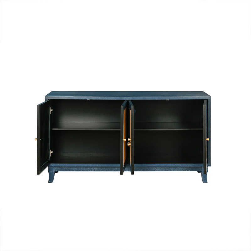 Elegant blue wood sideboard styled with books and decor in a cozy living room setting.
