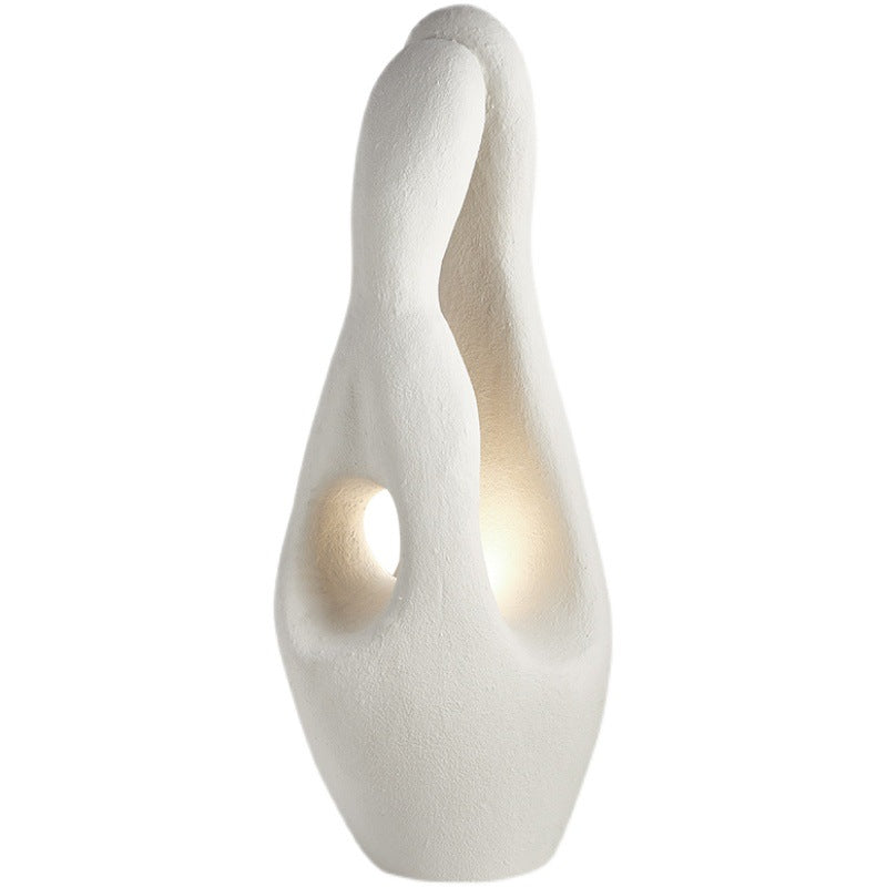 Elegant ambient lighting floor lamp positioned in a stylish foyer, creating a warm atmosphere.
