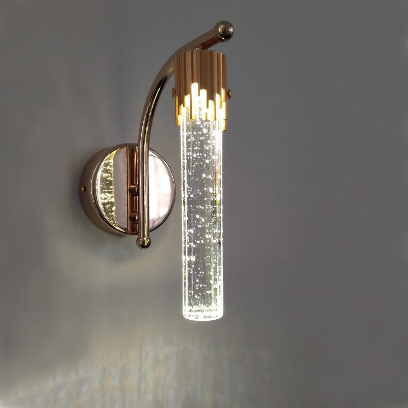 Elegant bubble glass wall sconce showcasing soft lighting in a stylish living room.