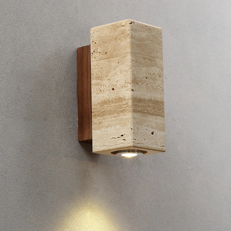 Close-up of the Elegant Japanese Travertine Waterproof Wall Sconce showcasing its rich textures and colors.